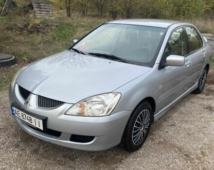 Серый Мицубиси Лансер, объемом двигателя 1.6 л и пробегом 289 тыс. км за 3150 $, фото 7 на Automoto.ua