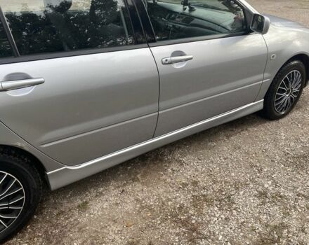 Серый Мицубиси Лансер, объемом двигателя 1.6 л и пробегом 289 тыс. км за 3150 $, фото 4 на Automoto.ua