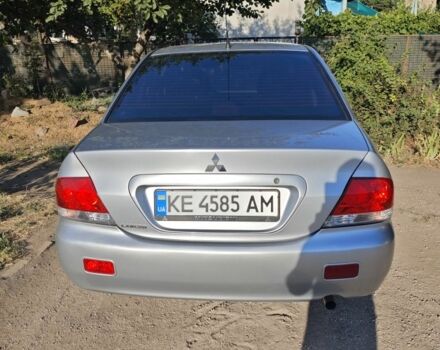 Серый Мицубиси Лансер, объемом двигателя 1.6 л и пробегом 98 тыс. км за 4800 $, фото 7 на Automoto.ua