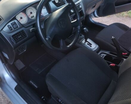 Серый Мицубиси Лансер, объемом двигателя 1.6 л и пробегом 98 тыс. км за 4800 $, фото 2 на Automoto.ua