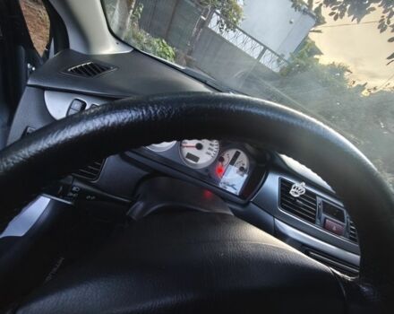 Серый Мицубиси Лансер, объемом двигателя 1.6 л и пробегом 98 тыс. км за 4800 $, фото 4 на Automoto.ua