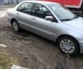Серый Мицубиси Лансер, объемом двигателя 1.6 л и пробегом 200 тыс. км за 3000 $, фото 1 на Automoto.ua
