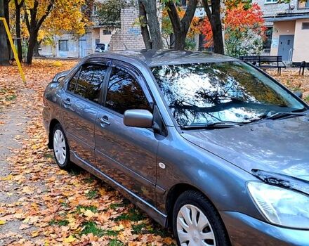 Сірий Міцубісі Lancer, об'ємом двигуна 1.6 л та пробігом 206 тис. км за 3300 $, фото 1 на Automoto.ua