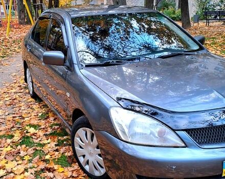 Сірий Міцубісі Lancer, об'ємом двигуна 1.6 л та пробігом 206 тис. км за 3300 $, фото 8 на Automoto.ua