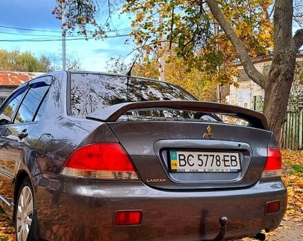 Сірий Міцубісі Lancer, об'ємом двигуна 1.6 л та пробігом 206 тис. км за 3300 $, фото 3 на Automoto.ua
