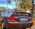 Сірий Міцубісі Lancer, об'ємом двигуна 1.6 л та пробігом 206 тис. км за 3300 $, фото 3 на Automoto.ua