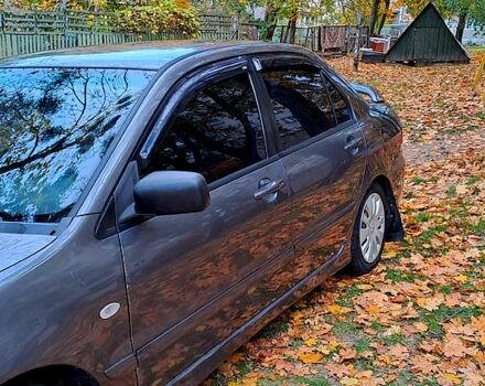 Сірий Міцубісі Lancer, об'ємом двигуна 1.6 л та пробігом 206 тис. км за 3300 $, фото 2 на Automoto.ua