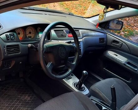 Сірий Міцубісі Lancer, об'ємом двигуна 1.6 л та пробігом 206 тис. км за 3300 $, фото 4 на Automoto.ua