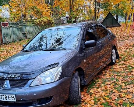 Сірий Міцубісі Lancer, об'ємом двигуна 1.6 л та пробігом 206 тис. км за 3300 $, фото 7 на Automoto.ua