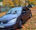 Сірий Міцубісі Lancer, об'ємом двигуна 1.6 л та пробігом 206 тис. км за 3300 $, фото 7 на Automoto.ua