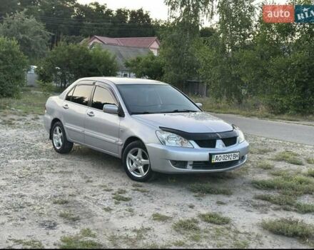 Серый Мицубиси Лансер, объемом двигателя 1.6 л и пробегом 197 тыс. км за 4200 $, фото 7 на Automoto.ua