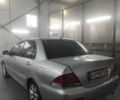 Серый Мицубиси Лансер, объемом двигателя 1.6 л и пробегом 330 тыс. км за 3900 $, фото 4 на Automoto.ua