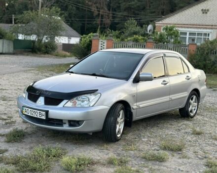 Серый Мицубиси Лансер, объемом двигателя 1.6 л и пробегом 197 тыс. км за 4200 $, фото 1 на Automoto.ua