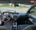 Серый Мицубиси Лансер, объемом двигателя 1.6 л и пробегом 197 тыс. км за 4200 $, фото 5 на Automoto.ua