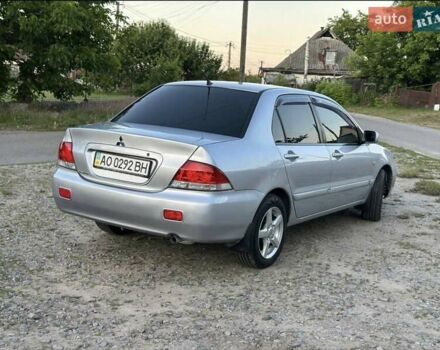 Серый Мицубиси Лансер, объемом двигателя 1.6 л и пробегом 197 тыс. км за 4200 $, фото 1 на Automoto.ua