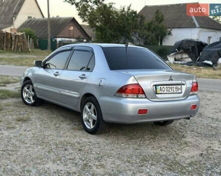 Серый Мицубиси Лансер, объемом двигателя 1.6 л и пробегом 197 тыс. км за 4200 $, фото 2 на Automoto.ua