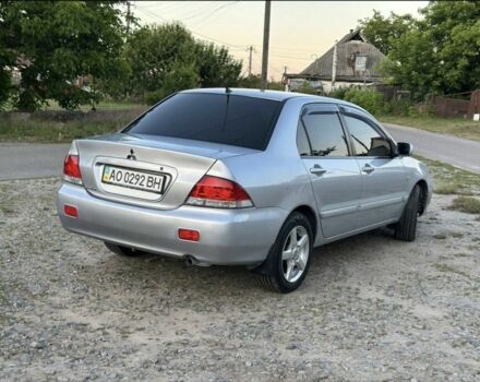 Серый Мицубиси Лансер, объемом двигателя 1.6 л и пробегом 197 тыс. км за 4200 $, фото 2 на Automoto.ua
