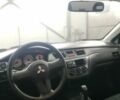 Серый Мицубиси Лансер, объемом двигателя 1.6 л и пробегом 330 тыс. км за 3900 $, фото 7 на Automoto.ua