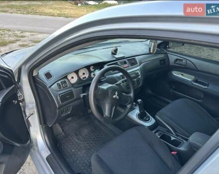 Серый Мицубиси Лансер, объемом двигателя 1.6 л и пробегом 197 тыс. км за 4200 $, фото 4 на Automoto.ua