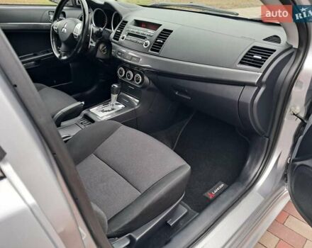 Серый Мицубиси Лансер, объемом двигателя 1.8 л и пробегом 155 тыс. км за 7350 $, фото 13 на Automoto.ua