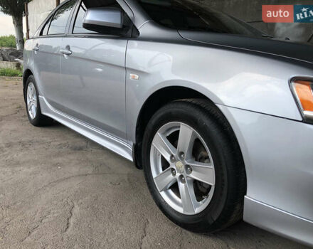 Серый Мицубиси Лансер, объемом двигателя 1.8 л и пробегом 120 тыс. км за 8000 $, фото 2 на Automoto.ua