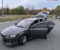 Серый Мицубиси Лансер, объемом двигателя 1.8 л и пробегом 240 тыс. км за 7200 $, фото 4 на Automoto.ua
