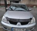 Сірий Міцубісі Lancer, об'ємом двигуна 1.6 л та пробігом 166 тис. км за 5000 $, фото 1 на Automoto.ua