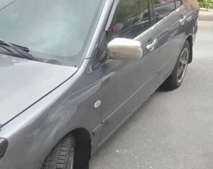 Серый Мицубиси Лансер, объемом двигателя 1.6 л и пробегом 318 тыс. км за 3350 $, фото 7 на Automoto.ua