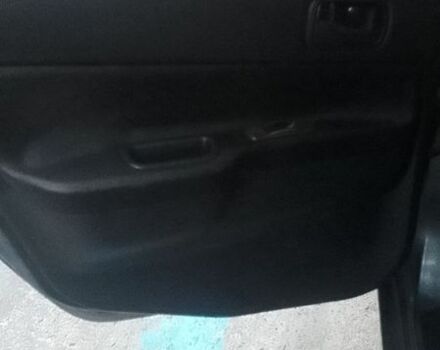 Серый Мицубиси Лансер, объемом двигателя 1.6 л и пробегом 318 тыс. км за 3350 $, фото 15 на Automoto.ua