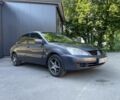 Сірий Міцубісі Lancer, об'ємом двигуна 1.6 л та пробігом 144 тис. км за 3900 $, фото 1 на Automoto.ua