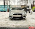 Сірий Міцубісі Lancer, об'ємом двигуна 1.8 л та пробігом 142 тис. км за 7000 $, фото 1 на Automoto.ua