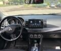 Серый Мицубиси Лансер, объемом двигателя 1.8 л и пробегом 238 тыс. км за 6500 $, фото 8 на Automoto.ua