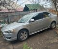 Сірий Міцубісі Lancer, об'ємом двигуна 2 л та пробігом 150 тис. км за 6200 $, фото 1 на Automoto.ua