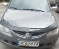 Серый Мицубиси Лансер, объемом двигателя 1.6 л и пробегом 318 тыс. км за 3500 $, фото 6 на Automoto.ua