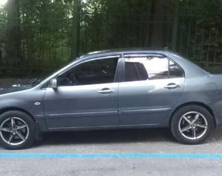 Серый Мицубиси Лансер, объемом двигателя 1.6 л и пробегом 318 тыс. км за 3350 $, фото 9 на Automoto.ua