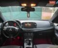 Сірий Міцубісі Lancer, об'ємом двигуна 1.8 л та пробігом 114 тис. км за 8800 $, фото 17 на Automoto.ua