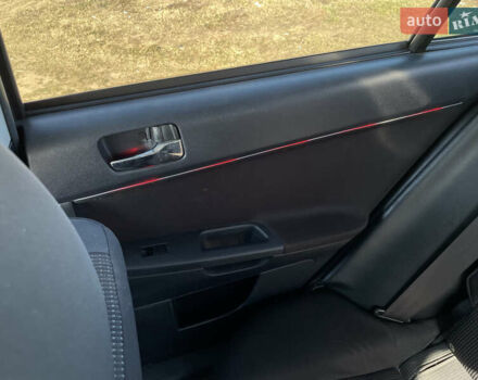 Серый Мицубиси Лансер, объемом двигателя 1.5 л и пробегом 139 тыс. км за 6600 $, фото 19 на Automoto.ua