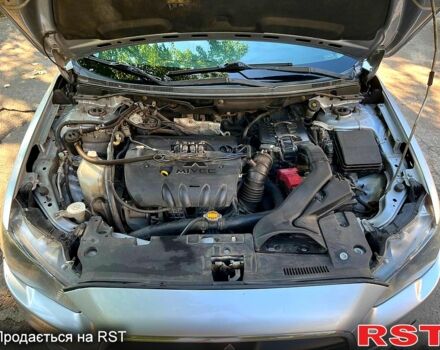 Серый Мицубиси Лансер, объемом двигателя 1.8 л и пробегом 246 тыс. км за 5600 $, фото 11 на Automoto.ua