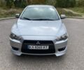 Сірий Міцубісі Lancer, об'ємом двигуна 1.8 л та пробігом 128 тис. км за 7500 $, фото 1 на Automoto.ua