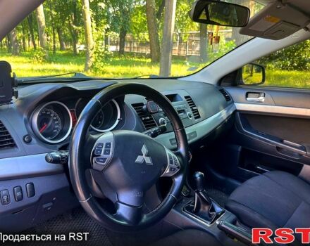 Серый Мицубиси Лансер, объемом двигателя 1.8 л и пробегом 246 тыс. км за 5600 $, фото 7 на Automoto.ua