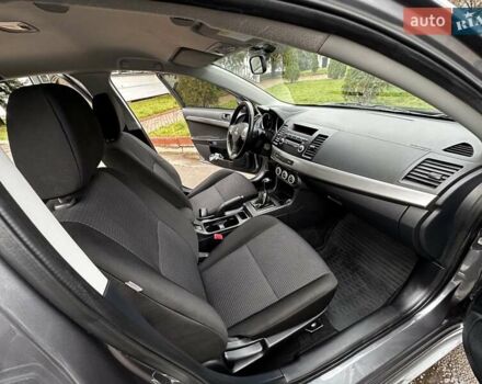 Серый Мицубиси Лансер, объемом двигателя 1.8 л и пробегом 44 тыс. км за 6499 $, фото 23 на Automoto.ua