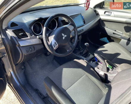 Серый Мицубиси Лансер, объемом двигателя 1.5 л и пробегом 139 тыс. км за 6600 $, фото 12 на Automoto.ua