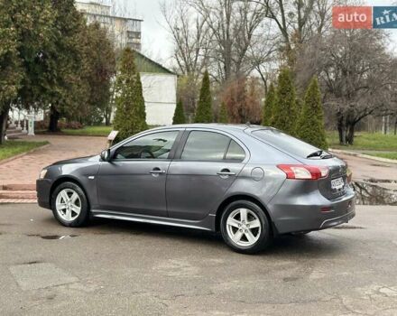 Серый Мицубиси Лансер, объемом двигателя 1.8 л и пробегом 44 тыс. км за 6499 $, фото 16 на Automoto.ua