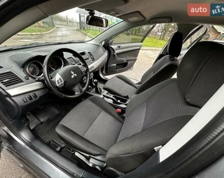 Серый Мицубиси Лансер, объемом двигателя 1.8 л и пробегом 44 тыс. км за 6499 $, фото 21 на Automoto.ua