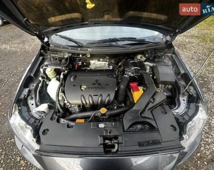 Серый Мицубиси Лансер, объемом двигателя 1.8 л и пробегом 44 тыс. км за 6499 $, фото 30 на Automoto.ua