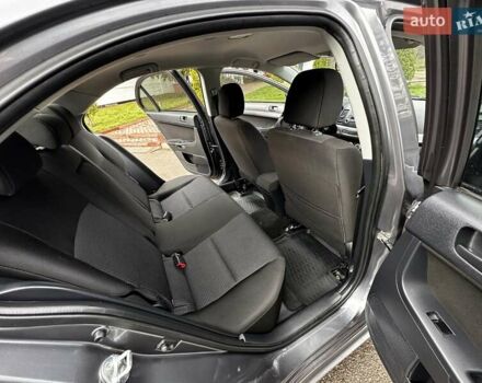 Серый Мицубиси Лансер, объемом двигателя 1.8 л и пробегом 44 тыс. км за 6499 $, фото 27 на Automoto.ua