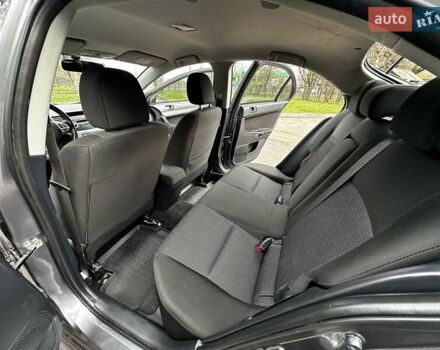 Серый Мицубиси Лансер, объемом двигателя 1.8 л и пробегом 44 тыс. км за 6499 $, фото 26 на Automoto.ua