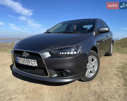 Серый Мицубиси Лансер, объемом двигателя 1.5 л и пробегом 139 тыс. км за 6600 $, фото 5 на Automoto.ua