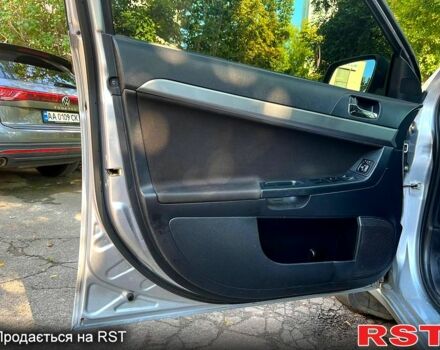 Серый Мицубиси Лансер, объемом двигателя 1.8 л и пробегом 246 тыс. км за 5600 $, фото 9 на Automoto.ua