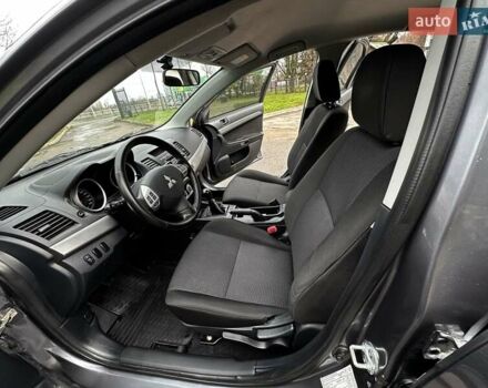 Серый Мицубиси Лансер, объемом двигателя 1.8 л и пробегом 44 тыс. км за 6499 $, фото 20 на Automoto.ua